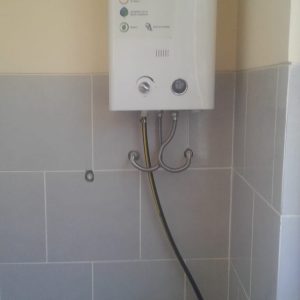 INSTALACION CALEFON TRUPER 11 L GAS LICUADO